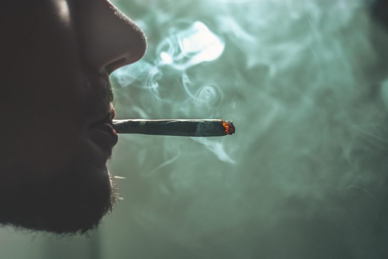 holding in your smoke